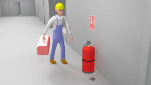 Contractor looking at fire extinguisher on the floor